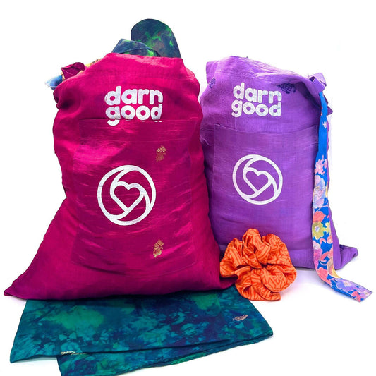 Two Sari Silk Reusable Tote Bags sitting on a white background.