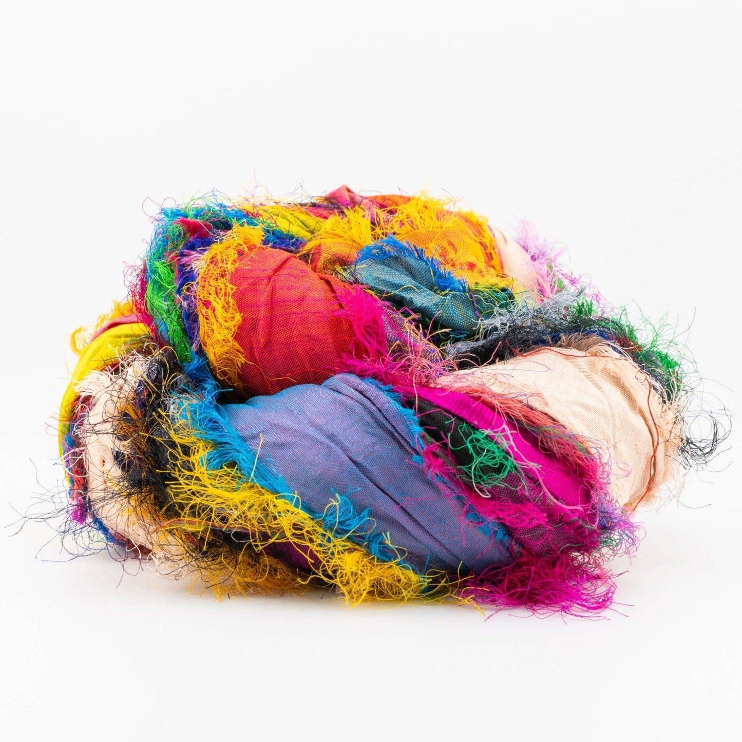 A rollled sari silk multi-colored ribbon.