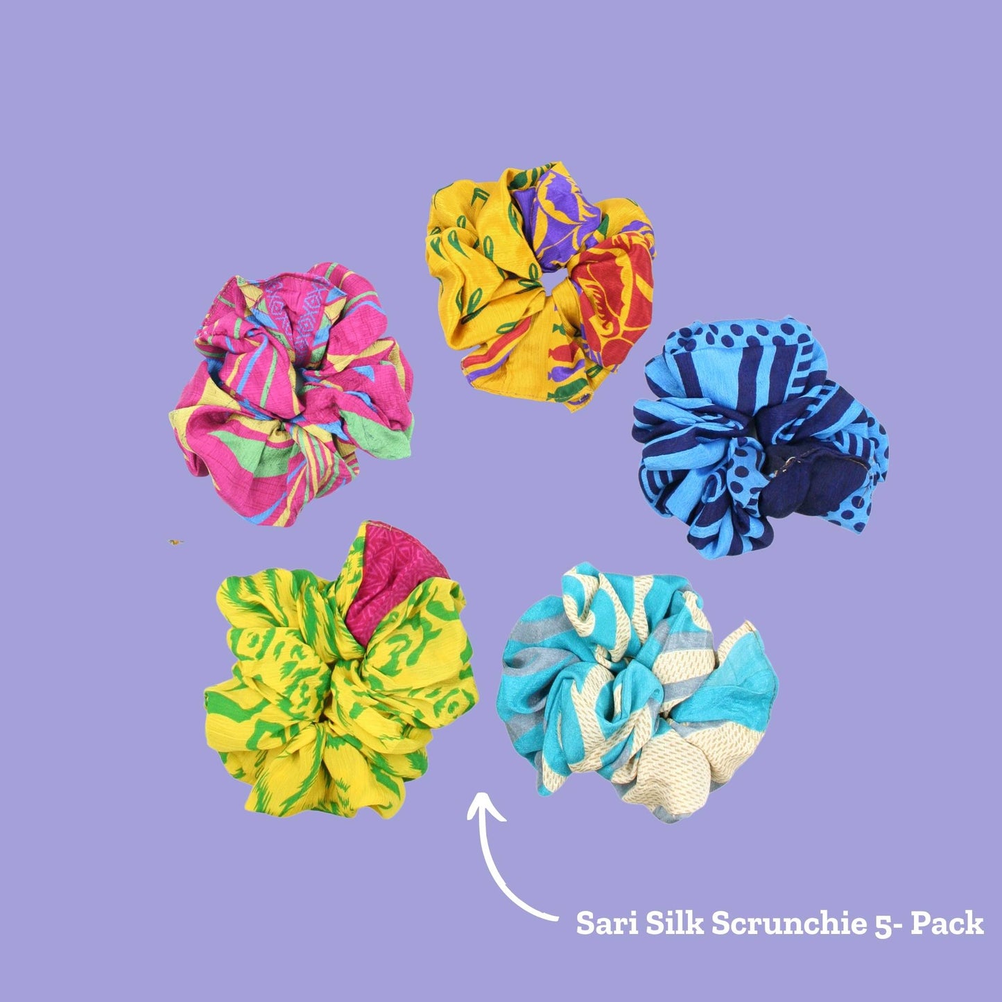 Five colorful sari silk scrunchies on a purple background. An arrow points to the scrunchies and reads Sari silk Scrunchie 5-Pack.