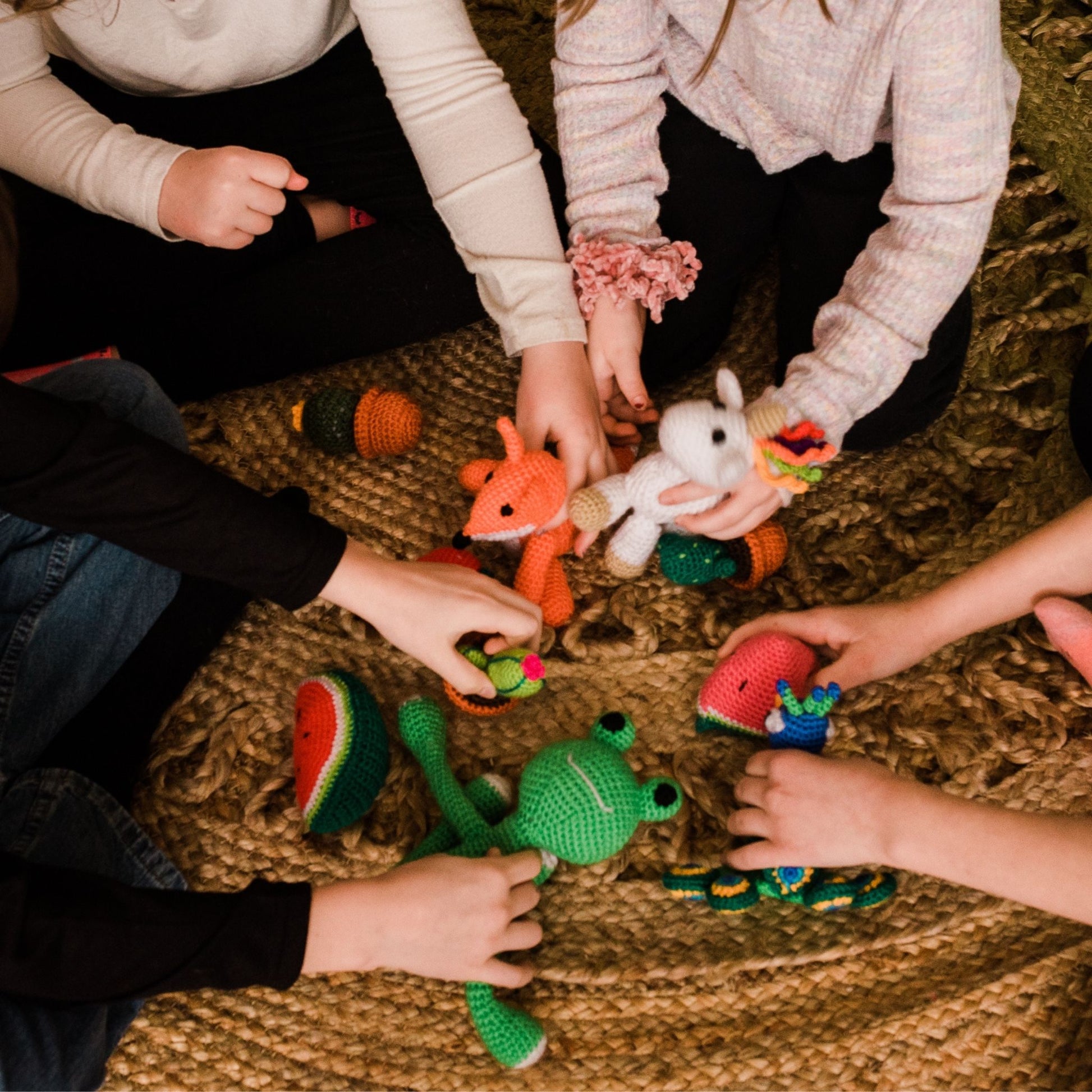 Kids hands playing with the DIY Stuffed Animal Knit & Crochet Kit Packs