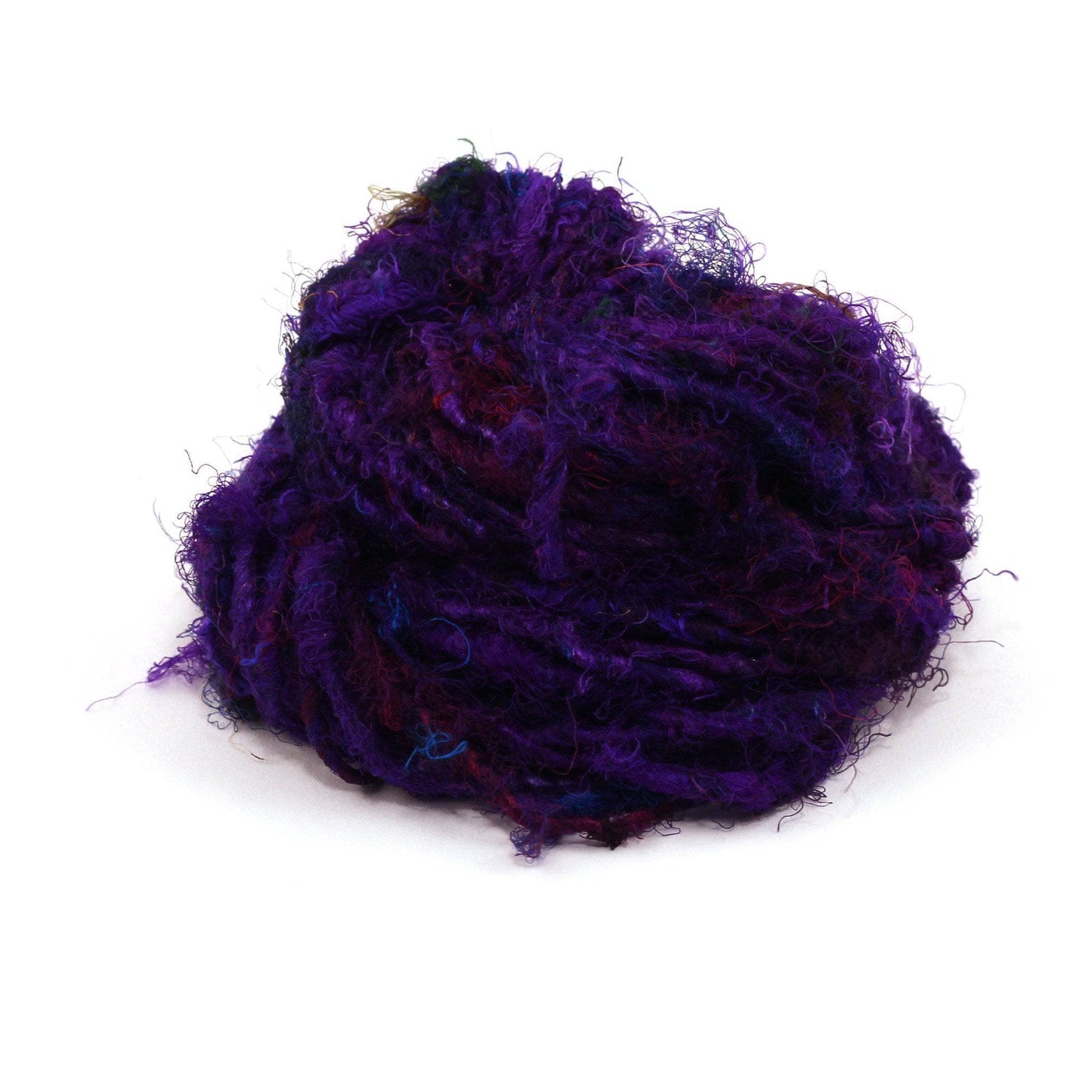Recycled Silk Yarn close up in the color "Indigo Amethyst," a rich royal purple, with a white background