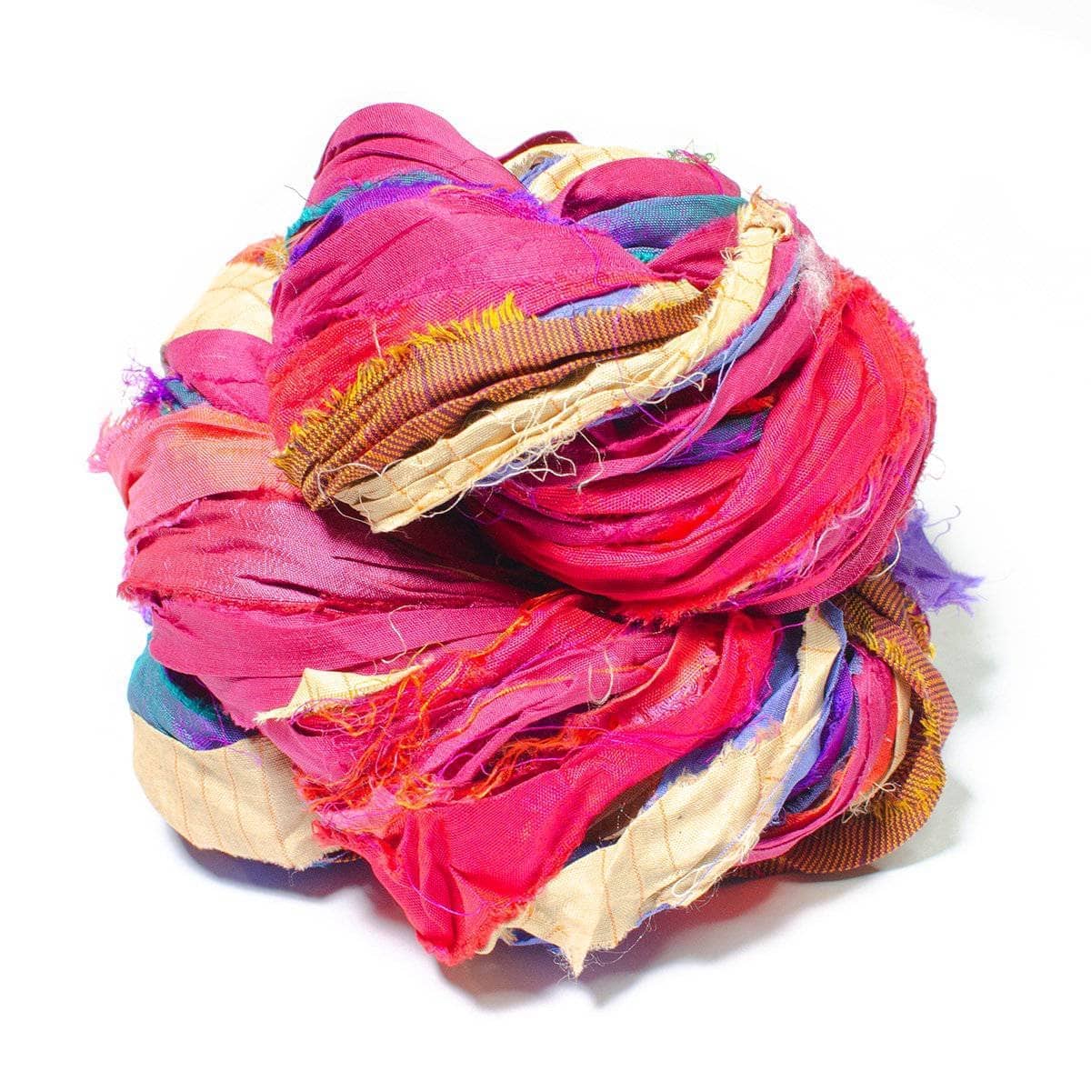 close up birds nest photo of one skein of sari silk ribbon yarn in the at the Bahamas base.