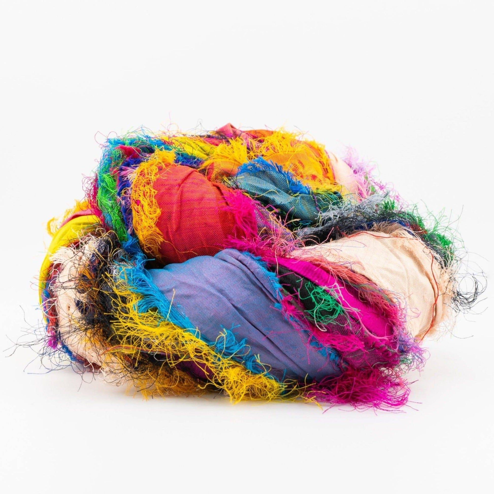 A rollled sari silk multi-colored ribbon.