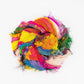 A rollled sari silk multi-colored ribbon.