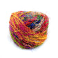 multicolored fuzzy cake of yarn