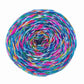 a cake of variegated twisted silk yarn in light blue, dark blue, pink, purple and yellow.