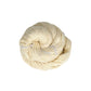 Lace weight silk yarn in color way white in front of white background.