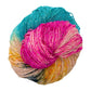 sparkle lace weight silk yarn in pink, yellow, and blue yarn with black speckles in front of a white background.