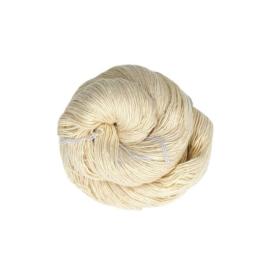 Lace weight silk yarn in color way white in front of white background.