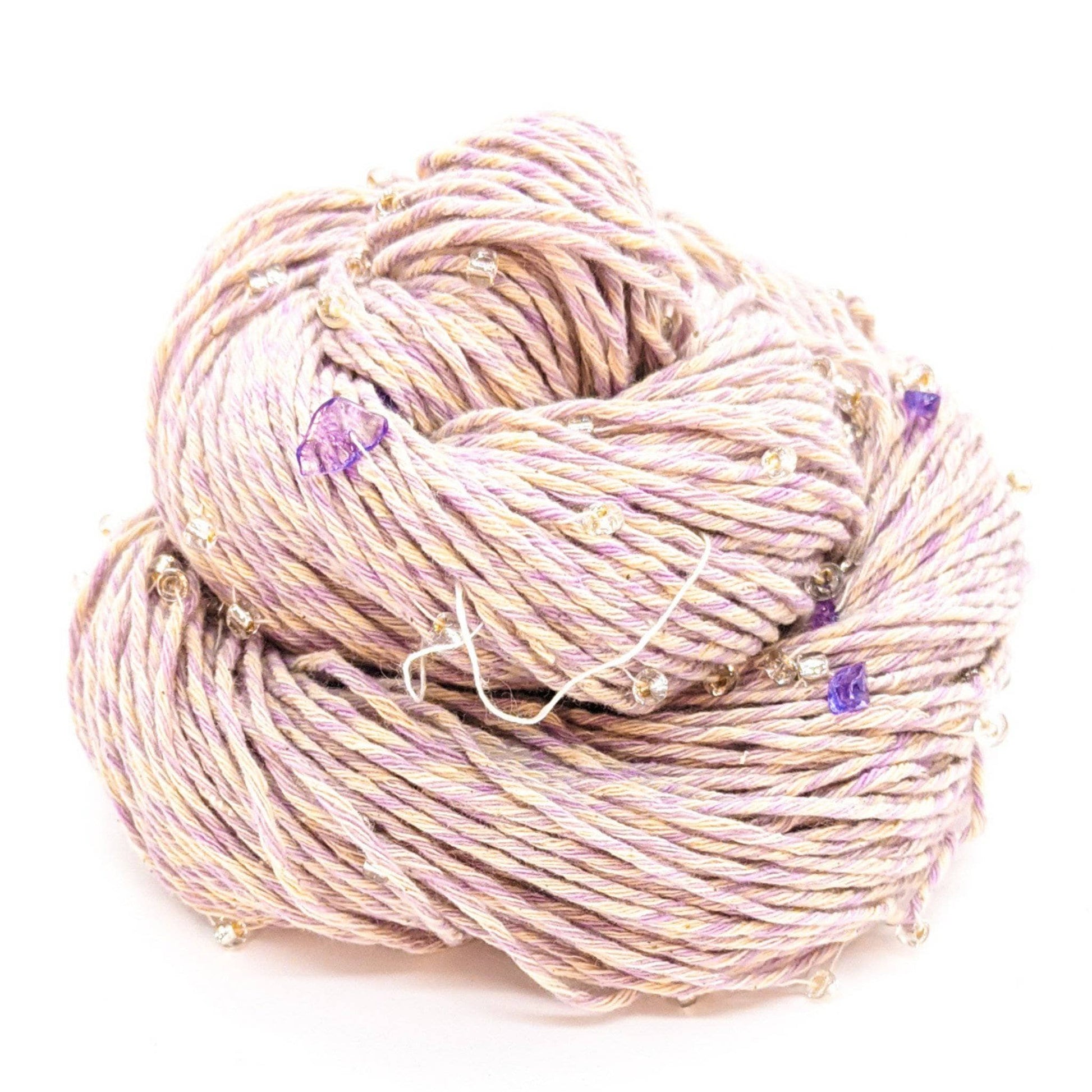 Light purple and white yarn with light purple beads and crystals throughout.