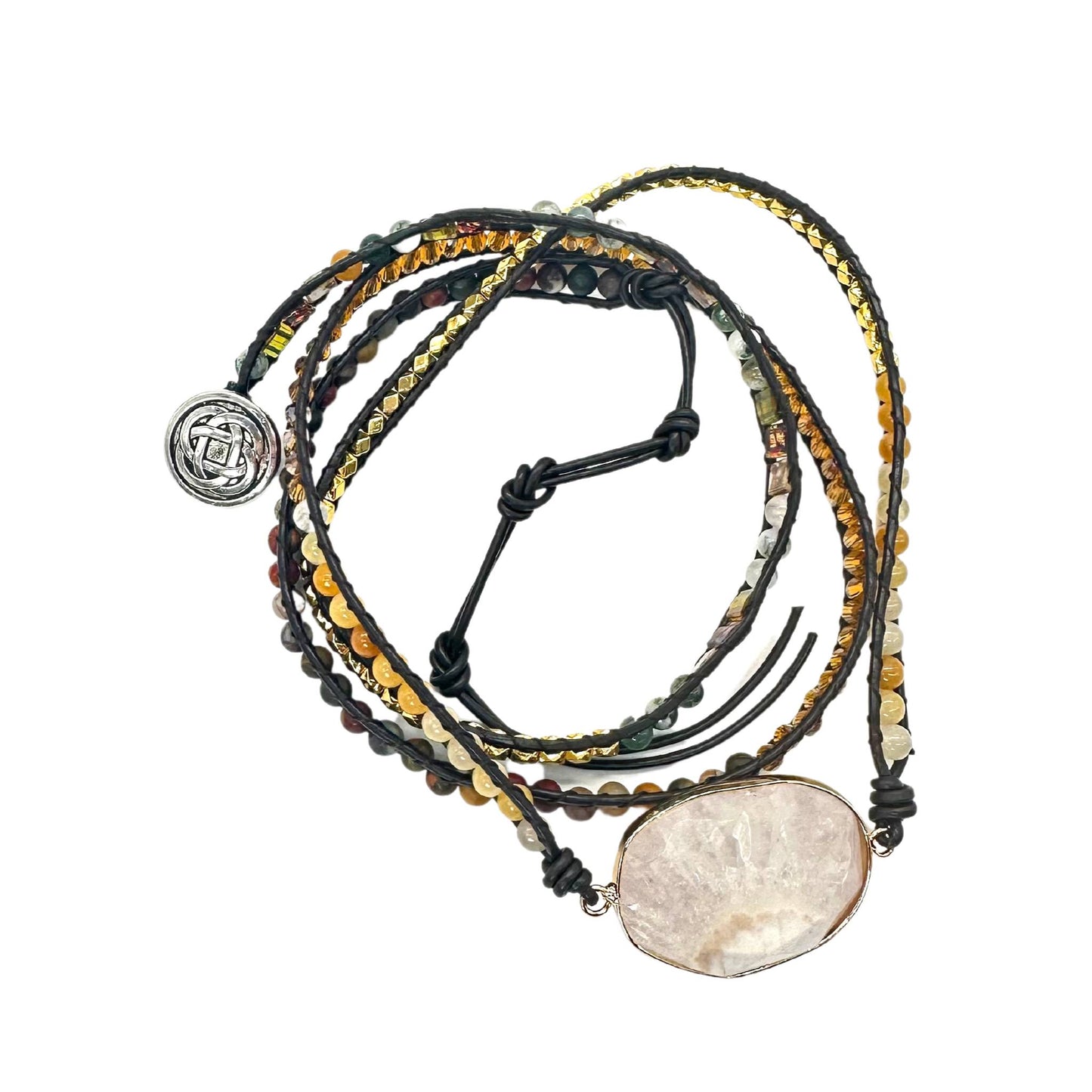A brown, tan, yellow and white wrap bracelet on a white background