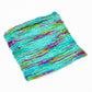knit swatch of rainbow sky peek a boo lace weight silk yarn (light blue and rainbow)