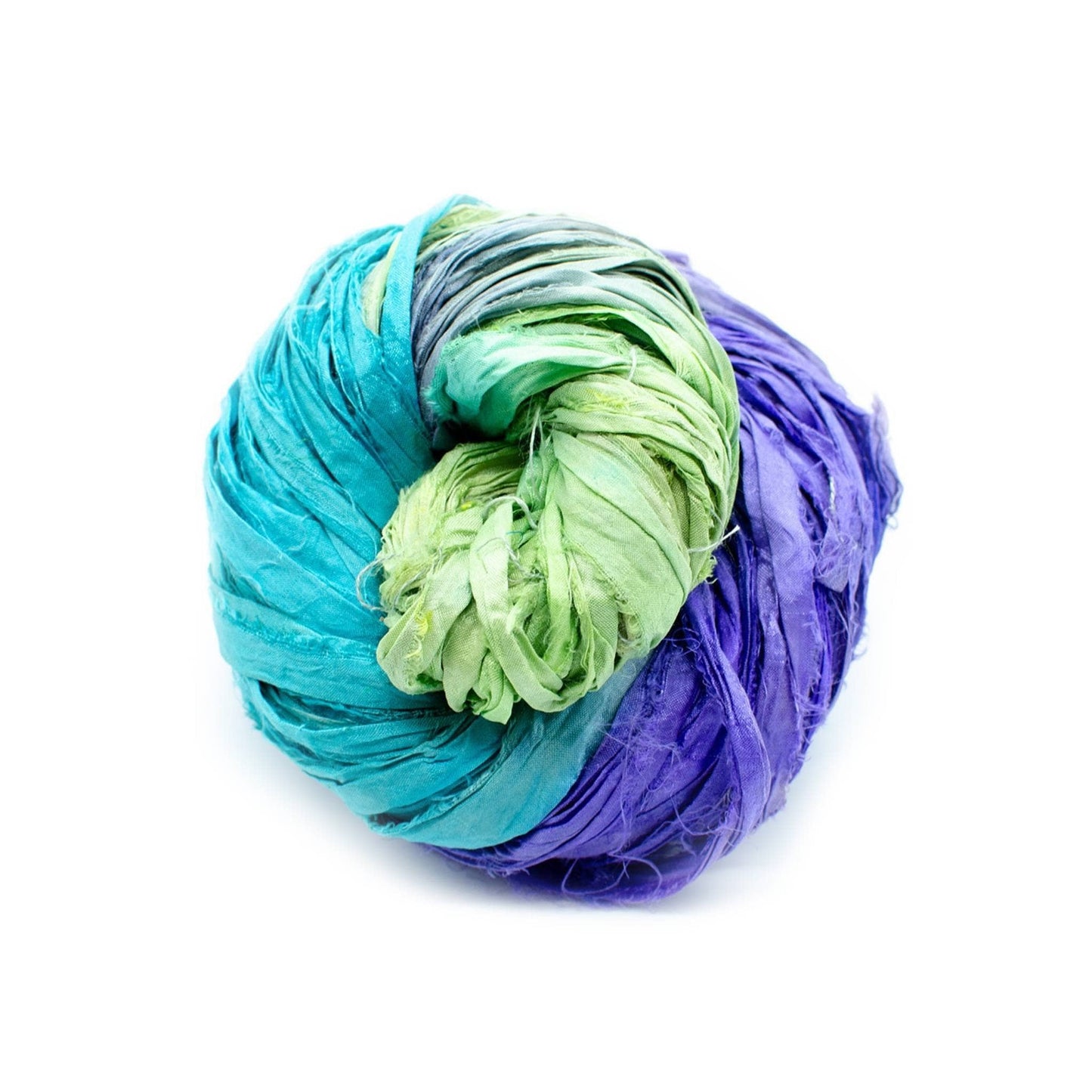A variegated skein of blue, purple, and green sari silk ribbon on a white background