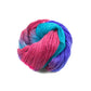 Sport weight silk yarn in Popsicle (Bright Blues, pinks and purples) in front of white background.