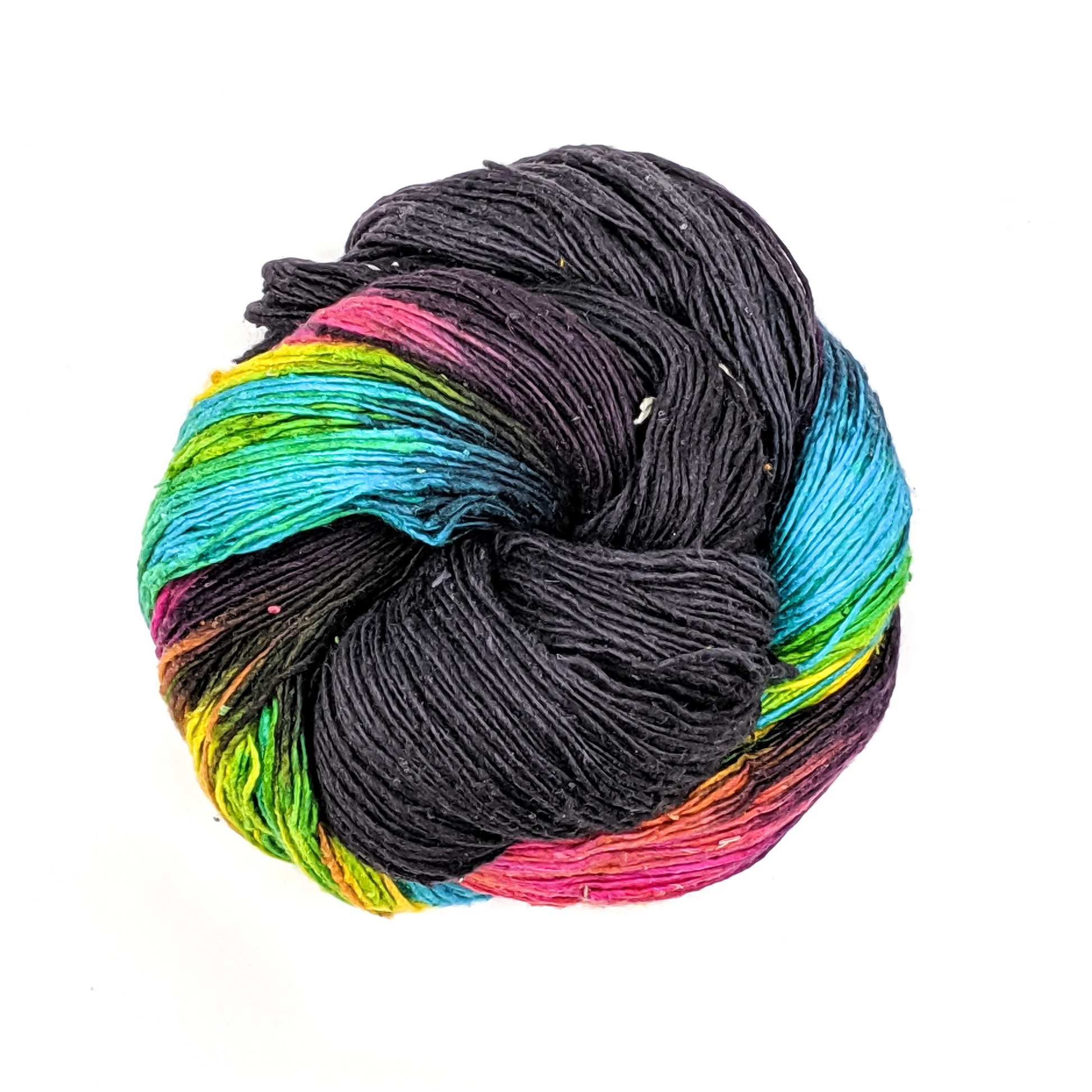a skein of lace weight silk yarn in black and multi colors