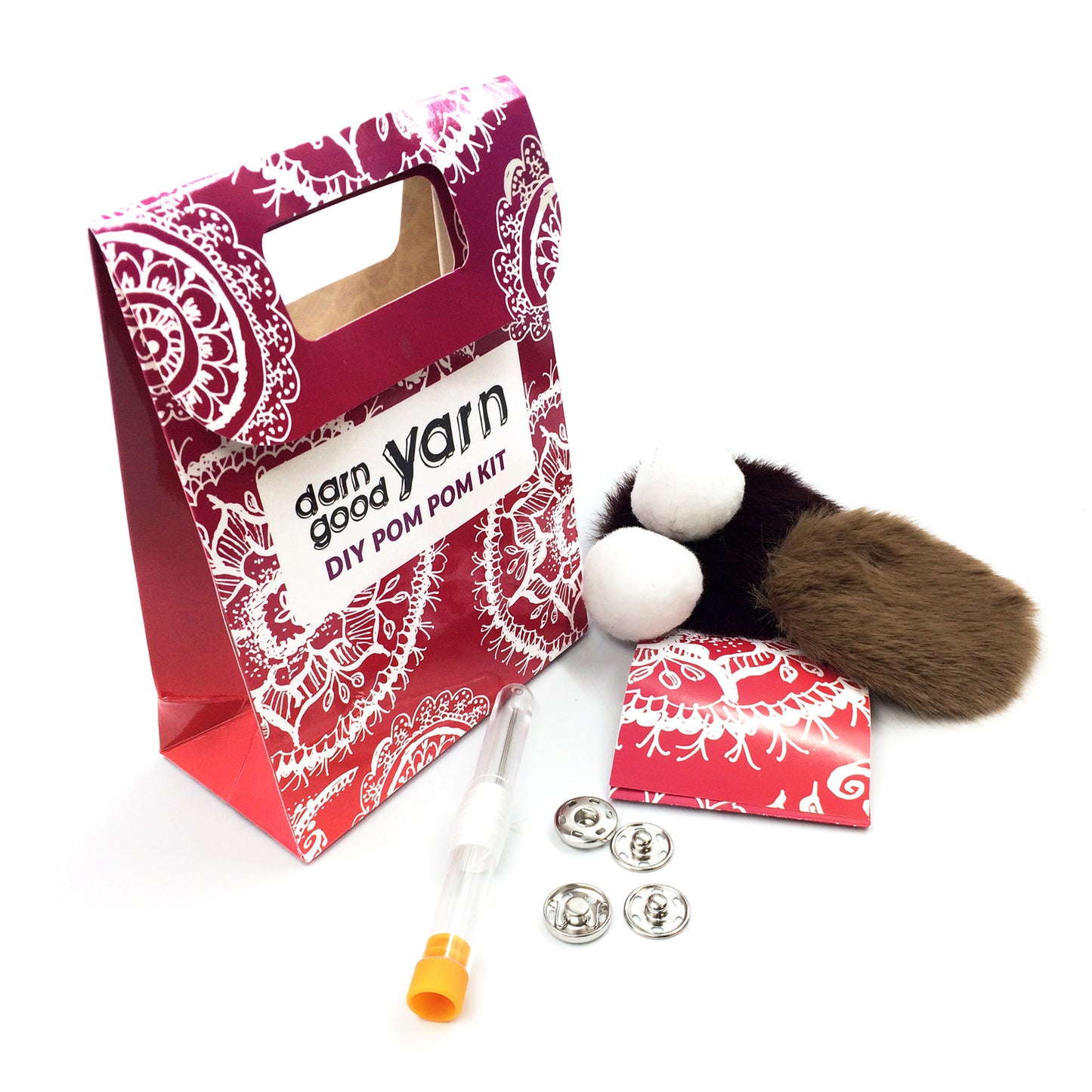 DIY Pom pom kit with all items showing in front of a white background.