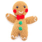 completed crochet gingerbread man amigurumi in front of a white background.