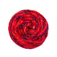 A skein of 3 shades of red and sparkle on a white background