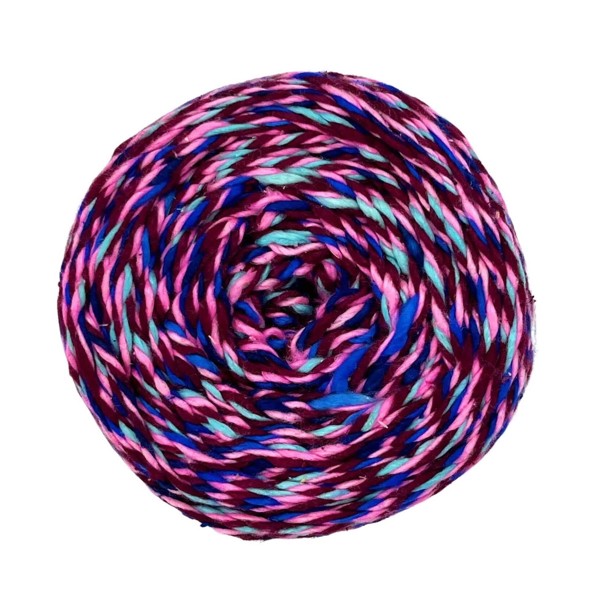 A skein of reclaimed silk yarn on a white background. The yarn is a triple ply yarn with dark plum, pink, turquoise navy and cobalt blue colors.