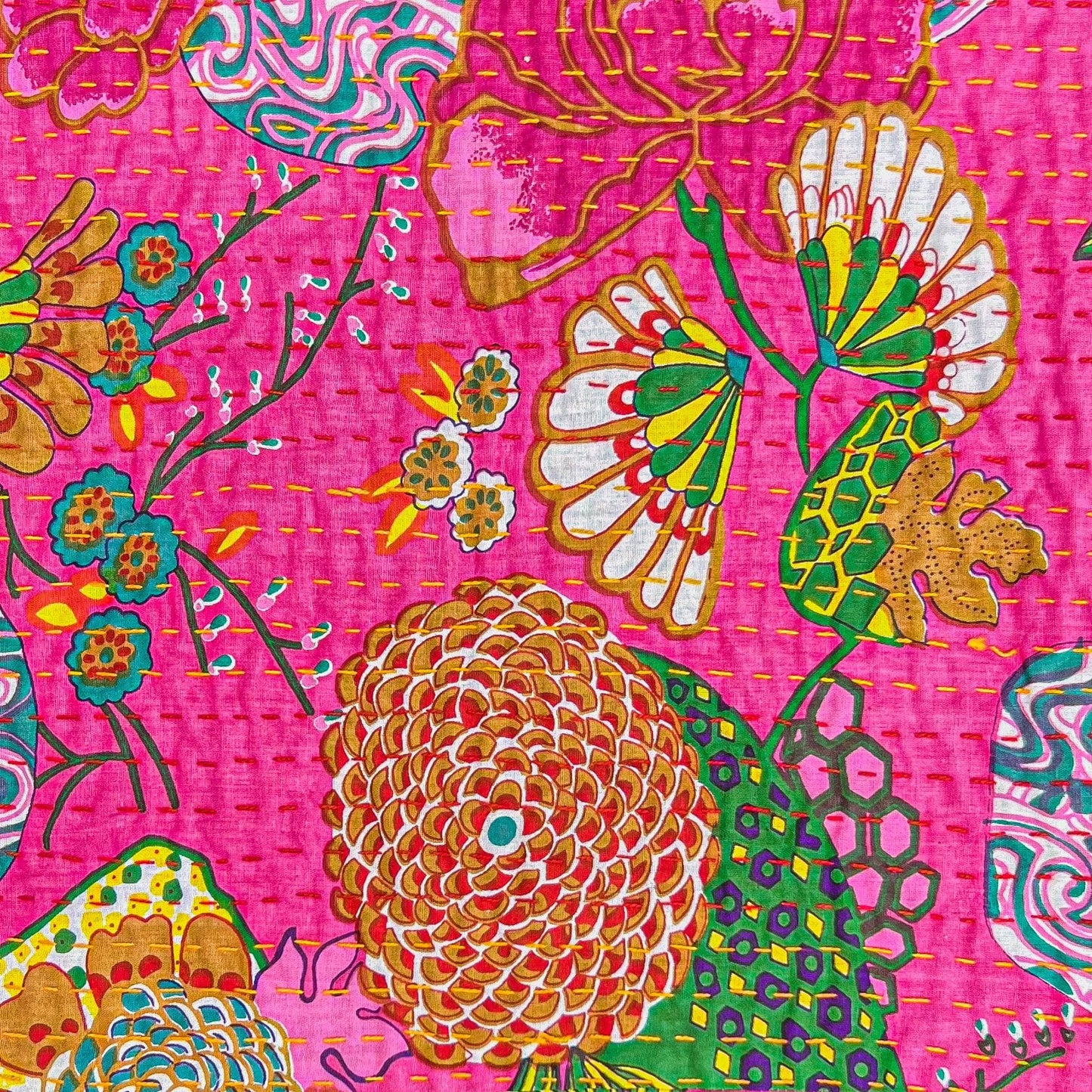 Close-up of tropical oasis kantha pillow cover pattern.