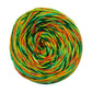 A skein of Journey Weight reclaimed silk yarn called Unbe-leaf-able on a white background.