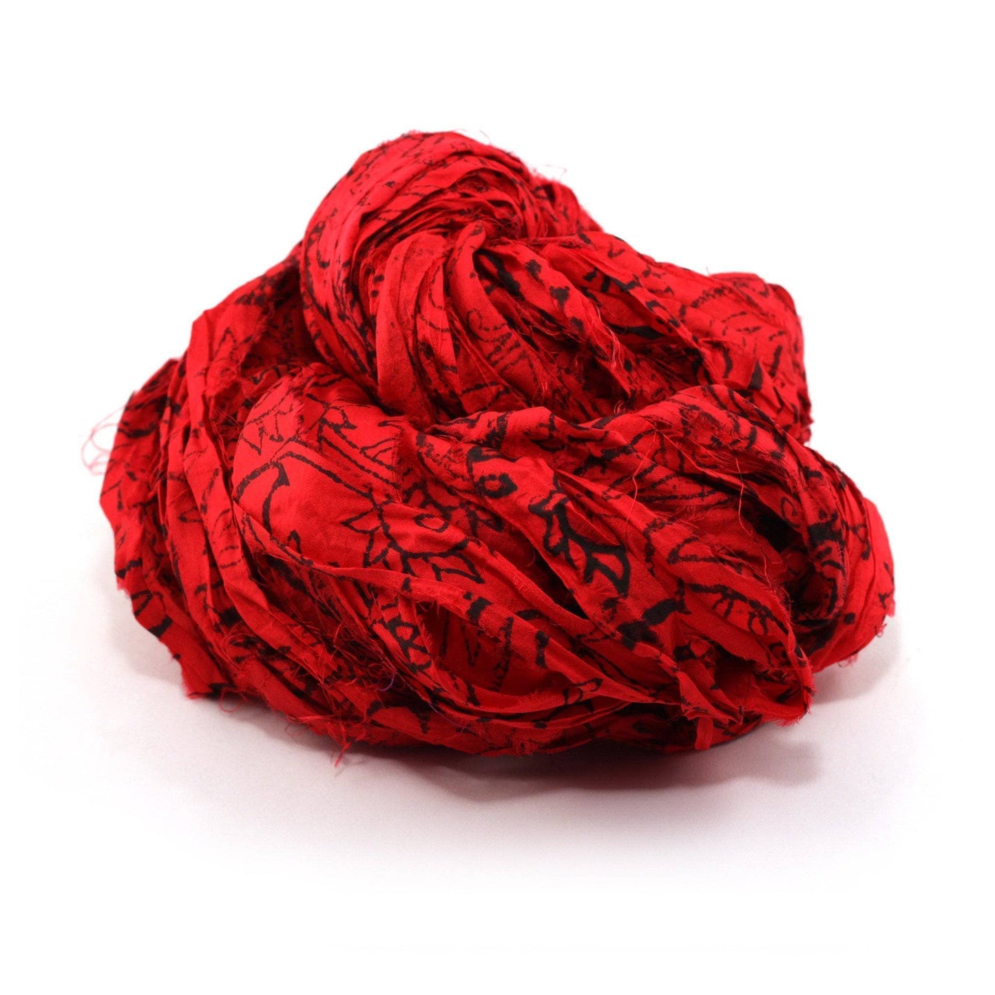 Block Printed Handmade Sari Silk Ribbon ball in Paisley Red on a white background