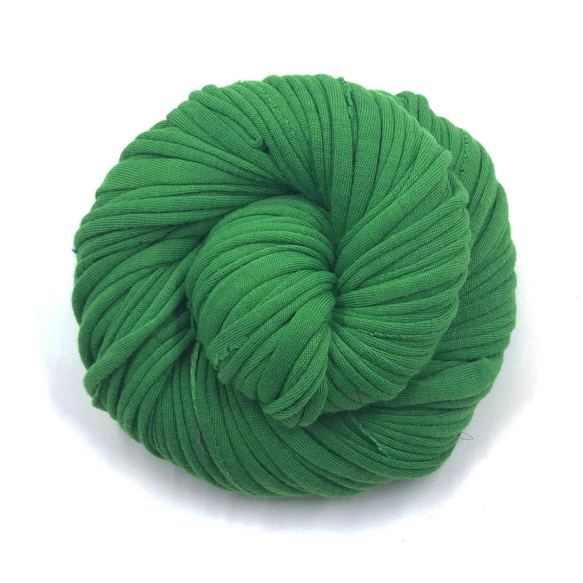 Cotton t-shirt yarn donut ball in Irish Dream (green) on white background