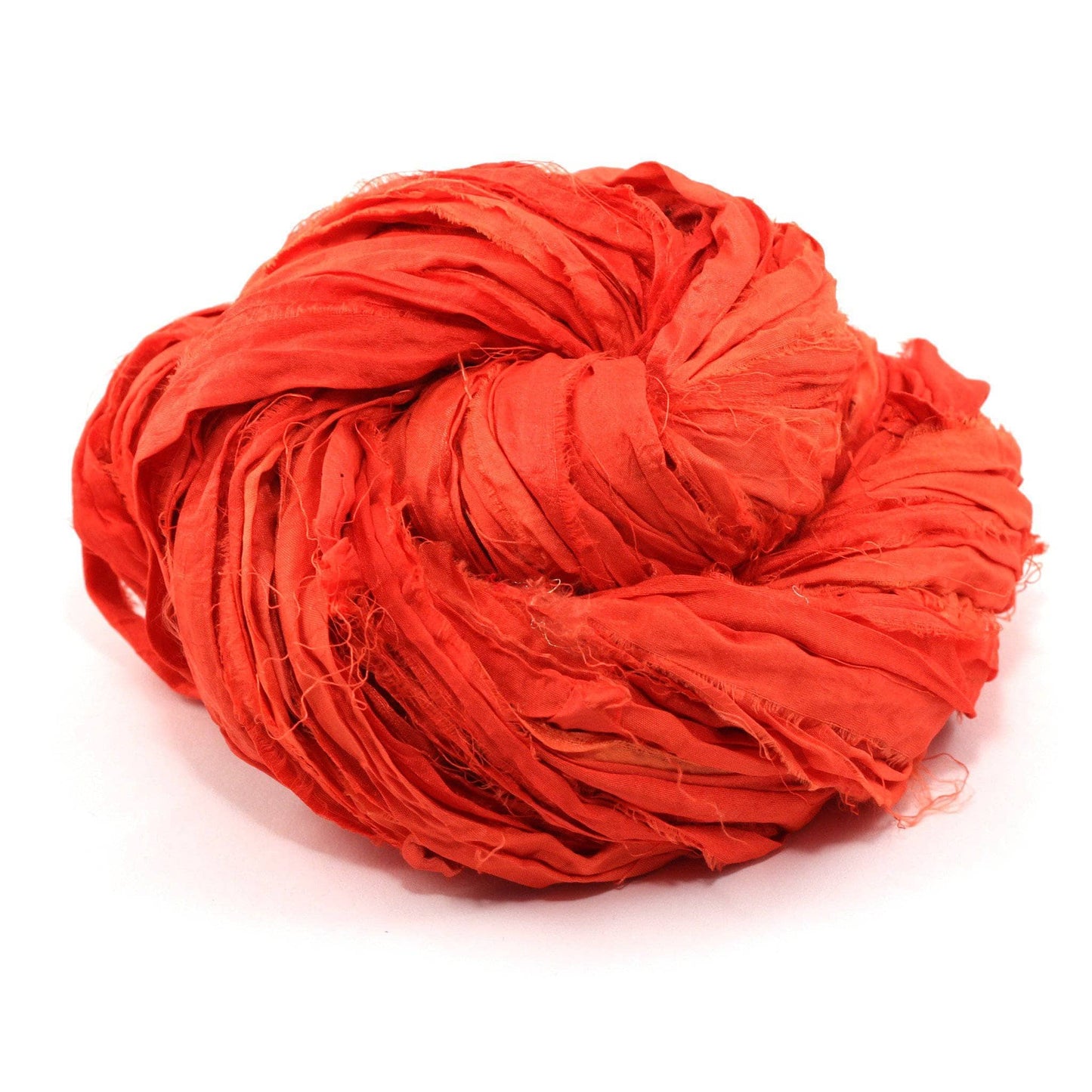 yarn cake in the color sodium orange with a white background