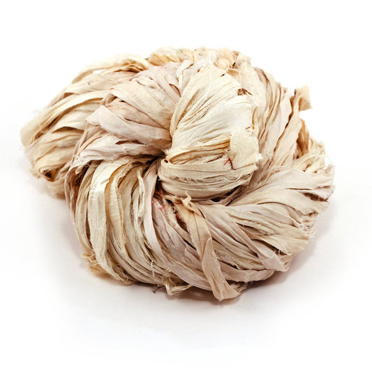 A white skein of sari ribbon on a white background