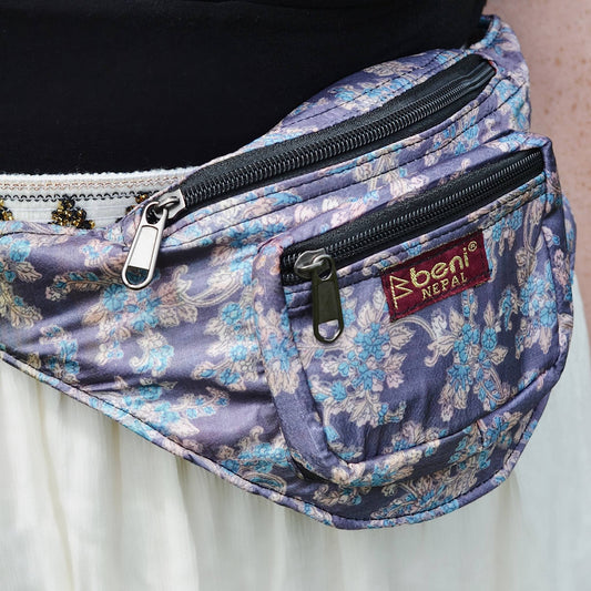 closeup of purple floral fanny pack