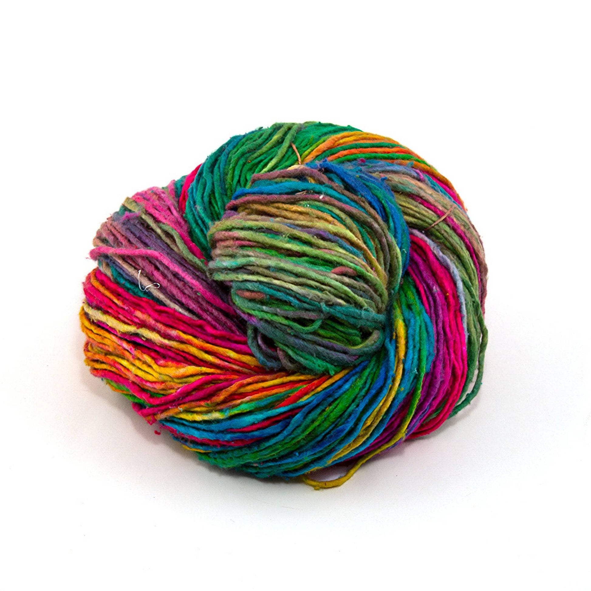 Single skien of worsted weight recycled silk yarn in watercolors (rainbow ombre, deeper rich colors) colorway in front of a white background.
